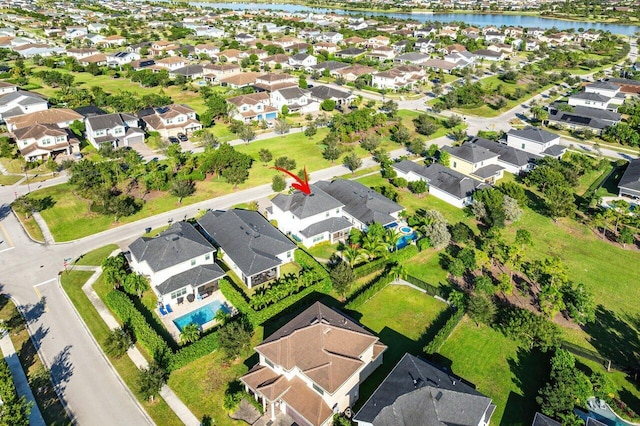 drone / aerial view featuring a water view