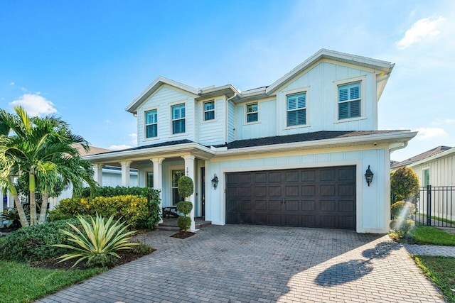 view of front of property featuring a garage