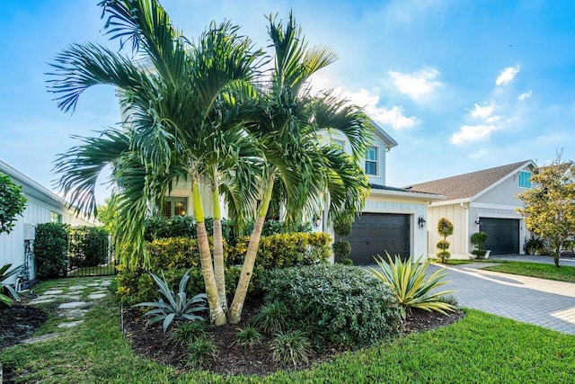 view of front of property with a garage