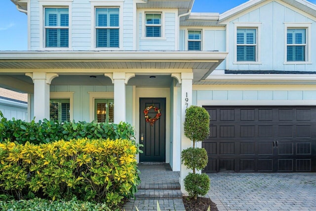 property entrance featuring a garage