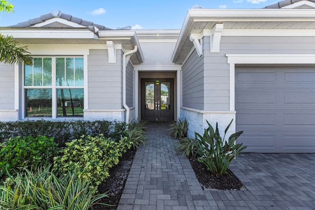 entrance to property featuring a garage