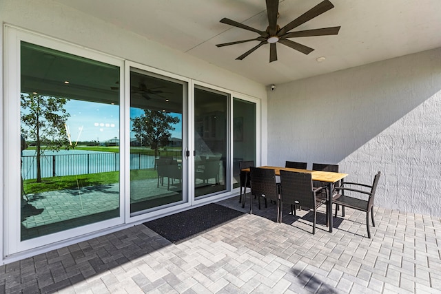 view of patio / terrace featuring ceiling fan