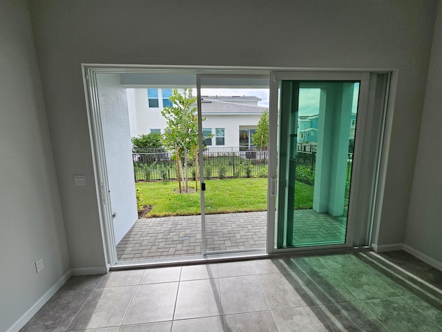 entryway featuring tile patterned flooring