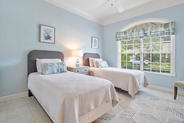 bedroom with ceiling fan, ornamental molding, and light tile patterned flooring