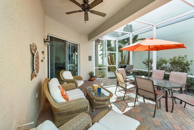 sunroom / solarium with ceiling fan