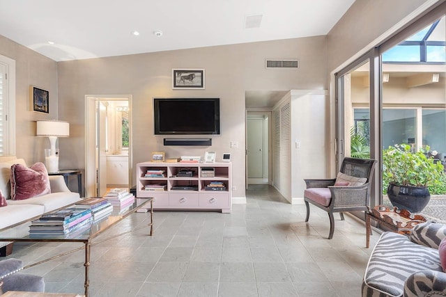 living room with vaulted ceiling