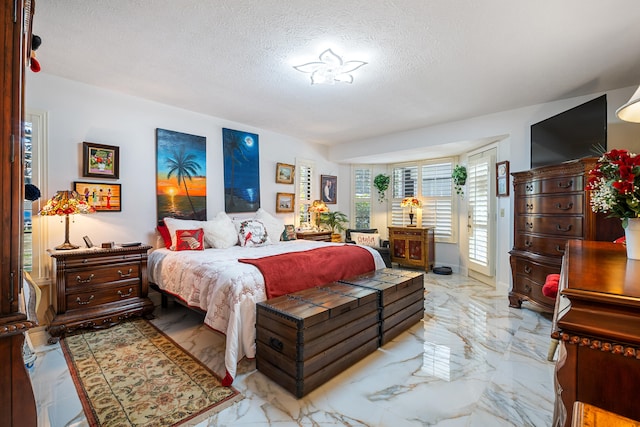 bedroom featuring a textured ceiling