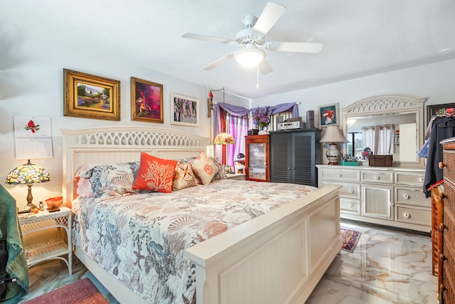 bedroom featuring ceiling fan