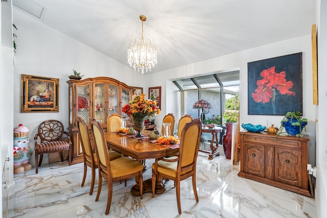 dining room featuring a chandelier