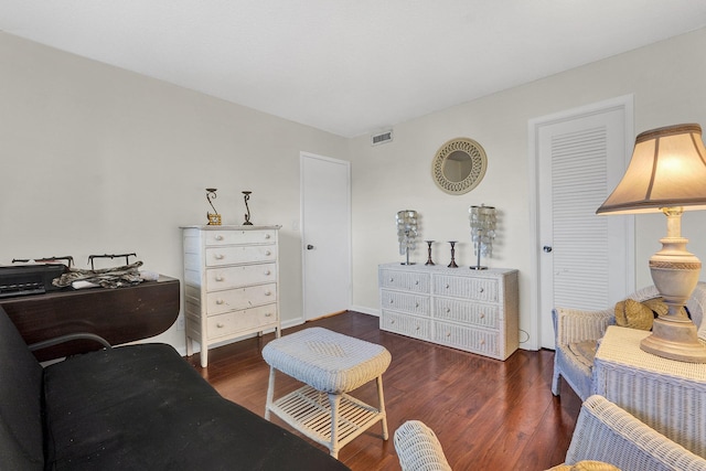 living area featuring dark hardwood / wood-style flooring