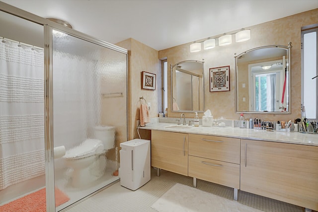 bathroom featuring tile patterned floors, curtained shower, and vanity