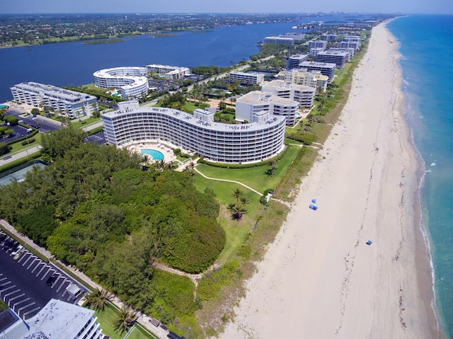 aerial view with a view of the beach and a water view