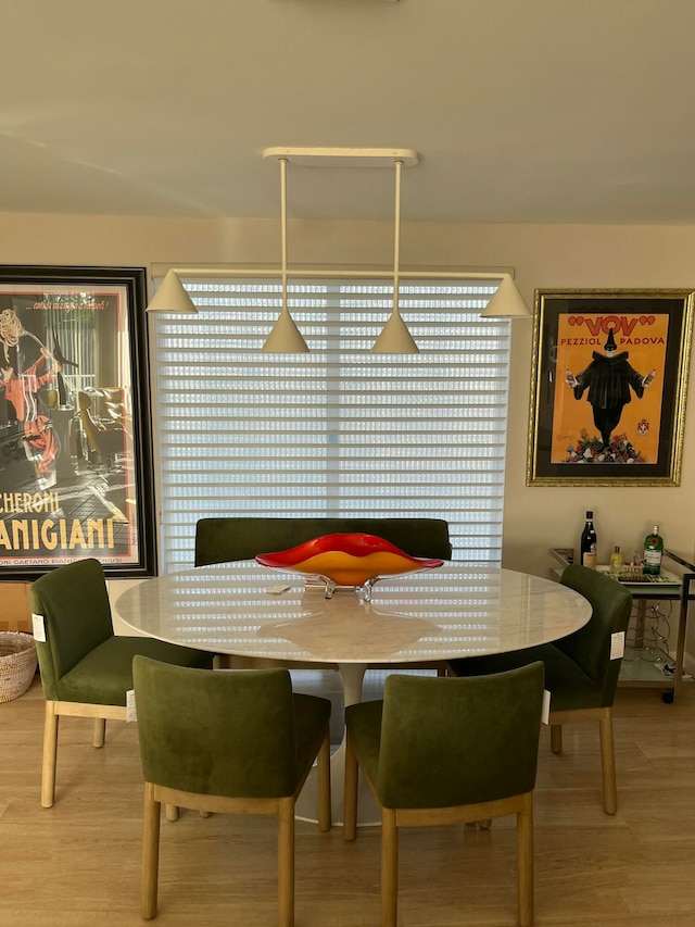 dining room with light hardwood / wood-style flooring