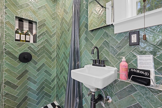 bathroom with tile walls