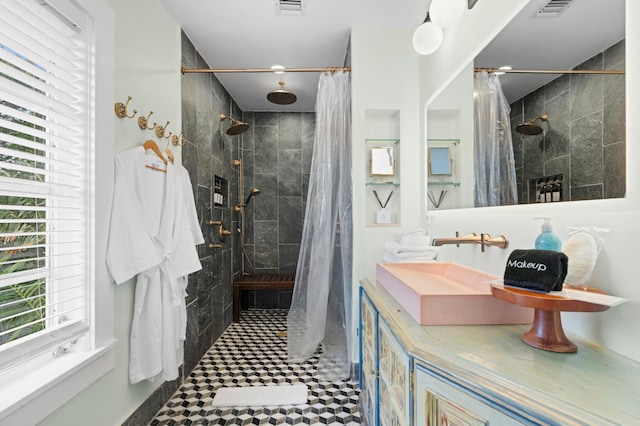 bathroom featuring sink and walk in shower