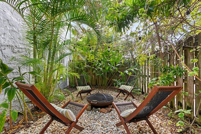 view of patio featuring a fire pit