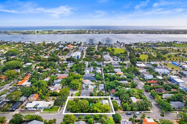 drone / aerial view with a water view