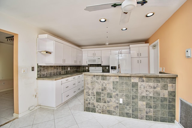 kitchen featuring ceiling fan, backsplash, white appliances, white cabinetry, and light tile patterned floors