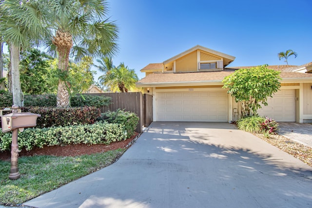 view of front of property with a garage