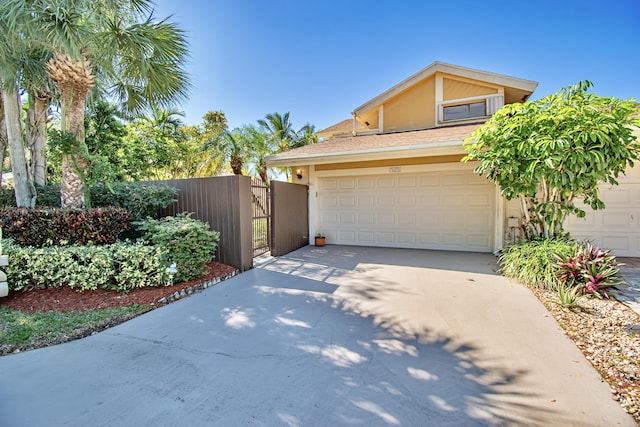 view of front of property with a garage