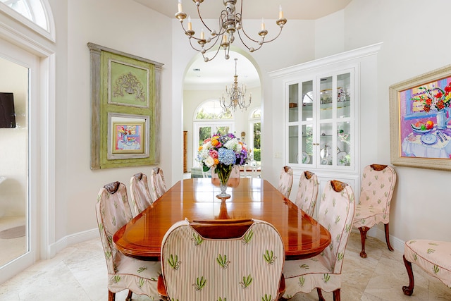 dining space with a chandelier