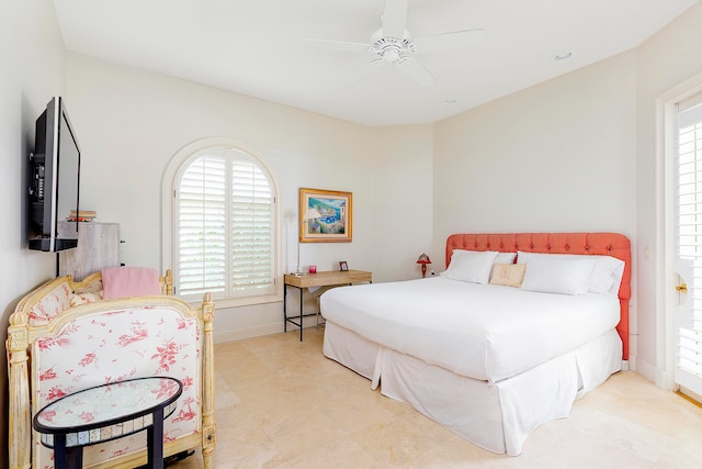 bedroom featuring ceiling fan and multiple windows