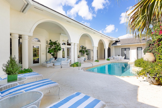 view of pool with an outdoor hangout area and a patio