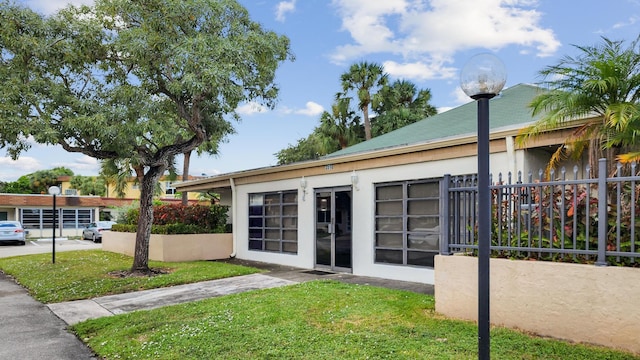 exterior space with a lawn