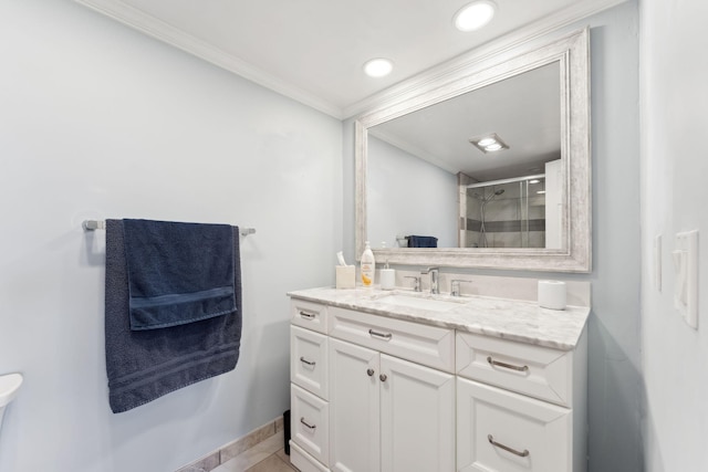 bathroom featuring tile patterned flooring, vanity, a shower with door, and crown molding