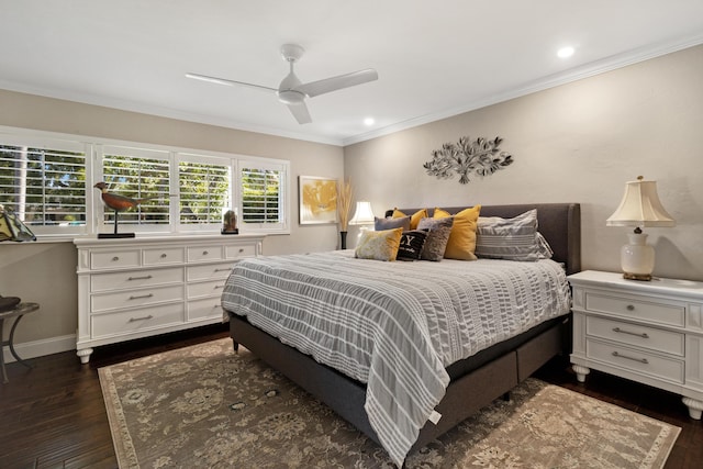 bedroom featuring ceiling fan, crown molding, and dark wood-type flooring