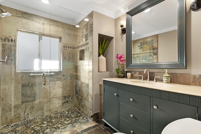 bathroom with crown molding, a shower with door, and vanity