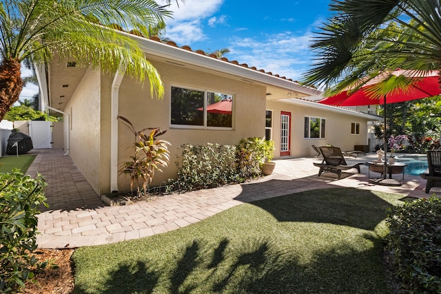 rear view of property with a patio