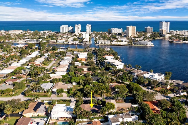 birds eye view of property featuring a water view