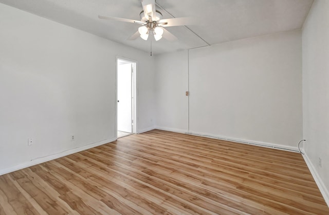 unfurnished room with ceiling fan and light hardwood / wood-style floors