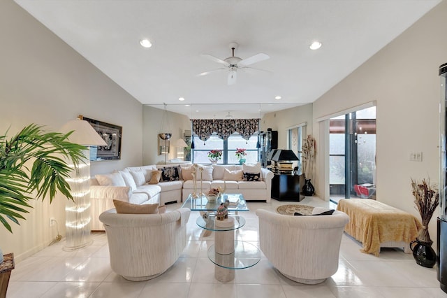 tiled living room featuring ceiling fan and a healthy amount of sunlight