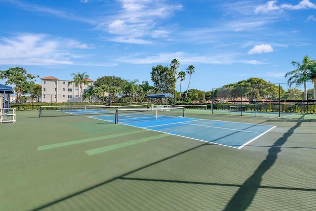 view of tennis court featuring basketball court