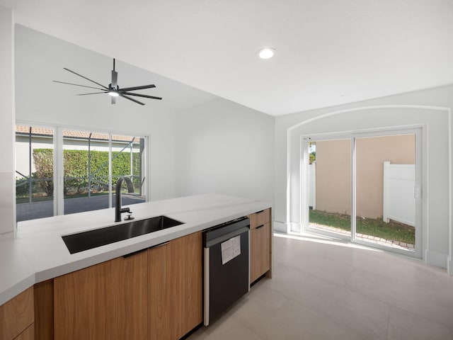 kitchen featuring ceiling fan, dishwasher, a healthy amount of sunlight, and sink