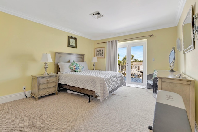 carpeted bedroom with access to exterior, french doors, and ornamental molding