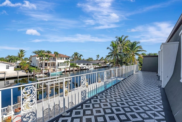 balcony featuring a water view