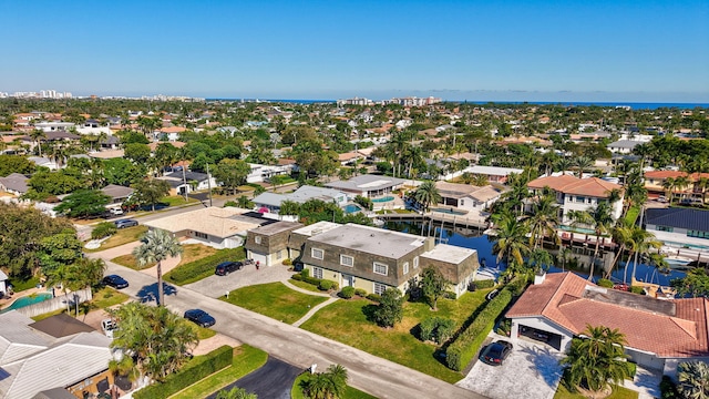 drone / aerial view with a water view