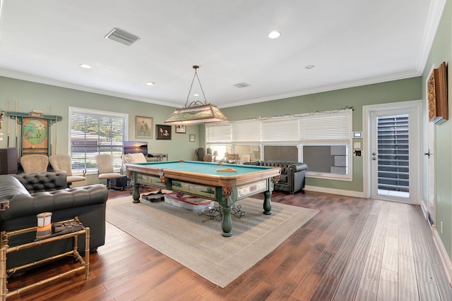 game room with ornamental molding, dark wood-type flooring, and billiards