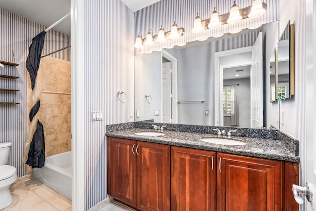 full bathroom featuring tile patterned flooring, vanity, toilet, and shower / bathtub combination with curtain