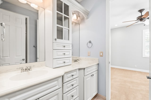 bathroom featuring vanity and ceiling fan