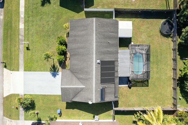 view of swimming pool with a patio and a lanai