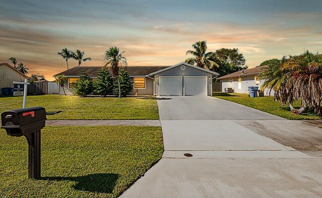 single story home featuring a front yard