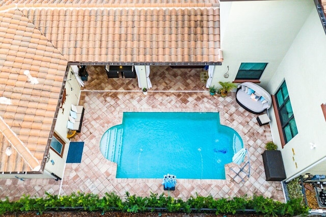 view of pool featuring a patio