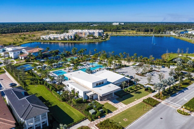 birds eye view of property with a water view