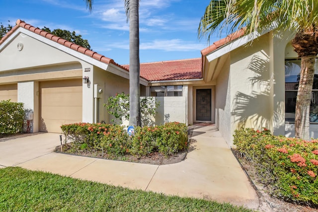 view of front of property with a garage