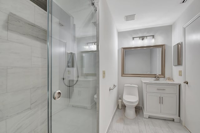 bathroom featuring vanity, toilet, and walk in shower