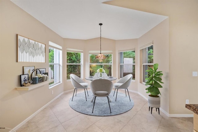 dining area with light tile patterned floors